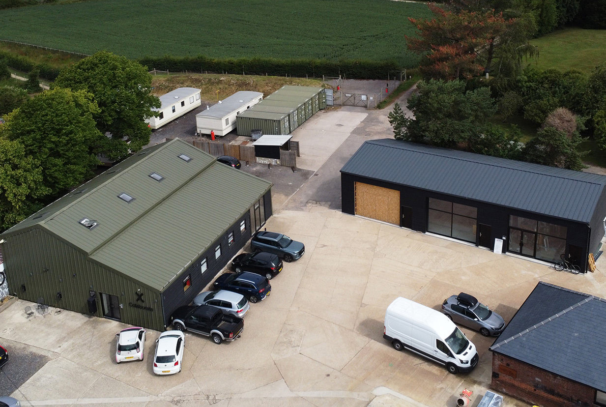 Two of Forma's steel-frame buildings on a small commercial estate. Different uses - retail and office.