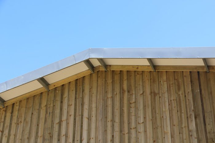 the apex of the new vineyard building with timber overboarding