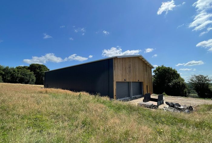 A side view of the winery building from the vineyard slopes