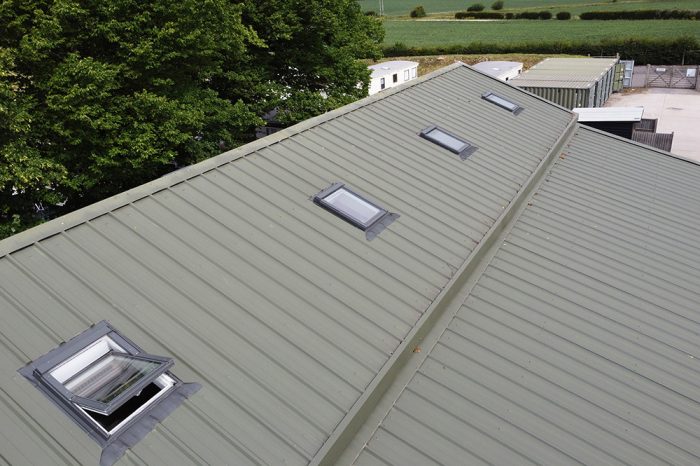Row of office skylight windows shown on a newly cladded industrial unit