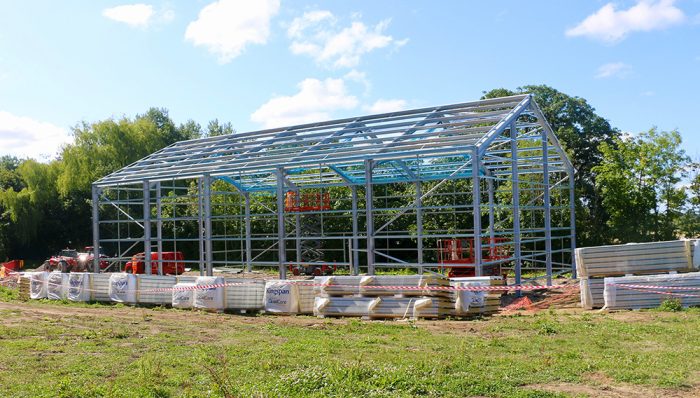 A winery production build under construction showing the steel frame